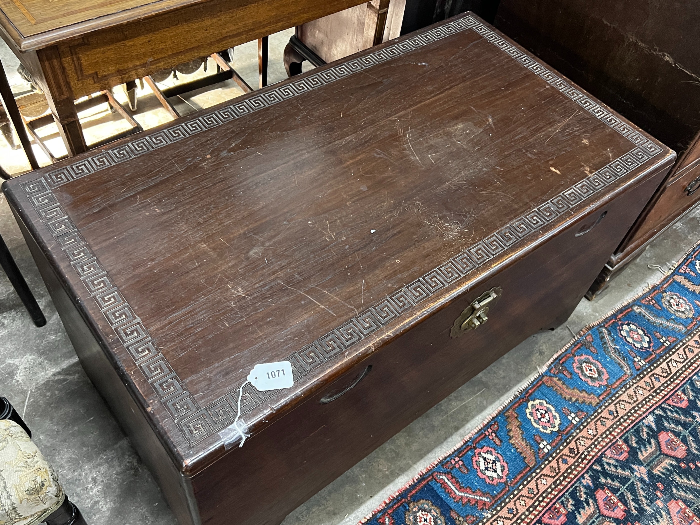 A Chinese camphorwood trunk, length 154cm, height 55cm